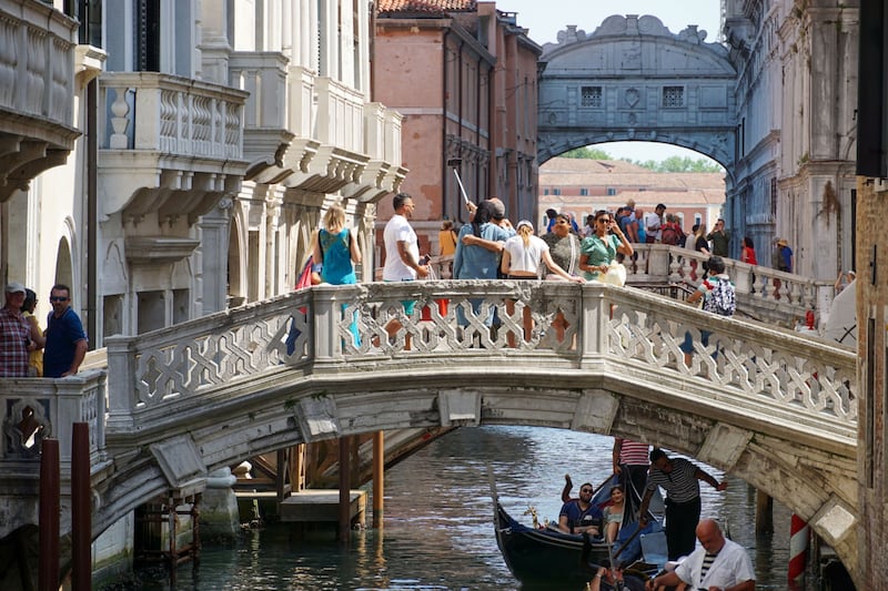 Venice's canals are drying up, as the city also battles with overtourism. Bloomberg