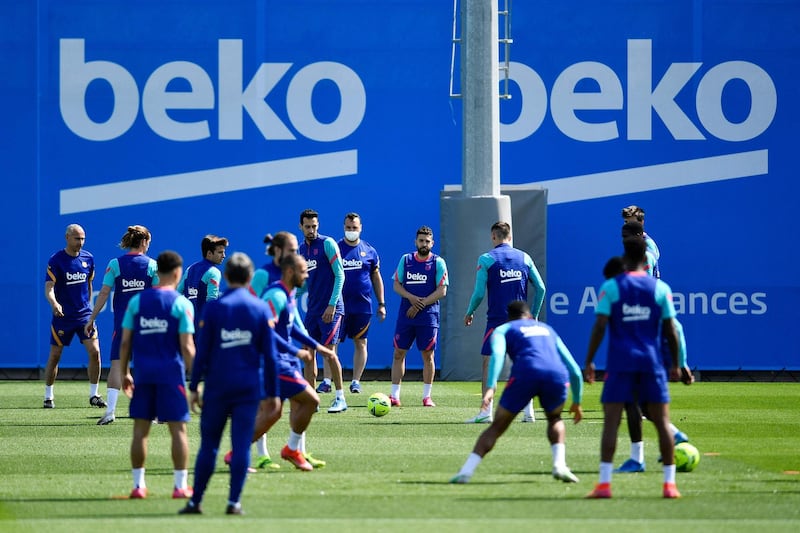 Barcelona players take part in a training session at the Joan Gamper Sports City. AFP