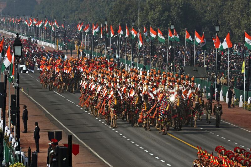 Camel mounted Indian Border Security Force soldiers march past Rajpath, the ceremonial boulevard, during Republic Day parade in New Delhi, India. AP