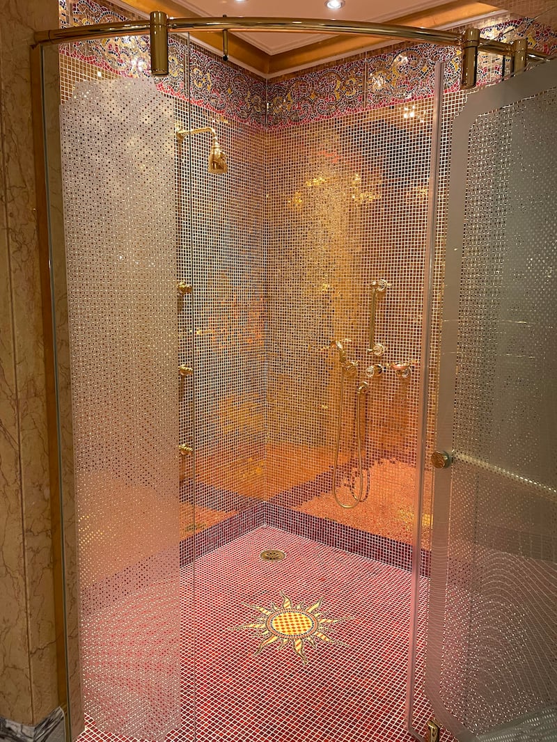 A shower with 24K gold tiles. Janice Rodrigues / The National