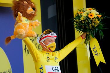 Team UAE Emirates rider Tadej Pogacar celebrates his incredible victory in the Tour de France yesterday. AFP