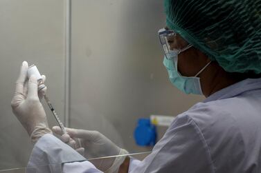 Researchers around the world are working towards developing a vaccine for Covid-19. Reuters 