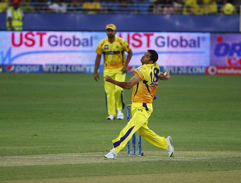 Mohit Sharma, No 18, bowls for Chennai Super Kings during their Indian Premier League match against Mumbai Indians at the Dubai International Cricket Stadium on April 25, 2014. Jeffrey E Biteng / The National