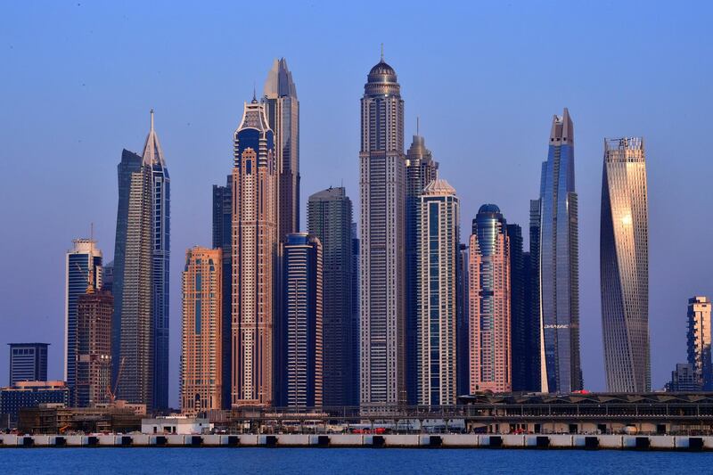 A picture taken on March 25, 2020 shows a skyline of skyscrapers in the Emirati city of Dubai . (Photo by GIUSEPPE CACACE / AFP)
