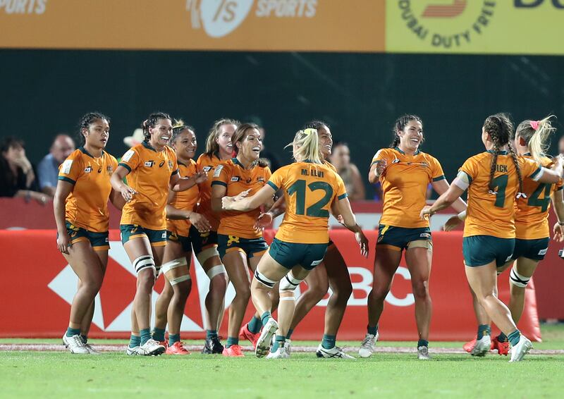Australia celebrate during their final victory over Fiji in the Dubai Sevens. .