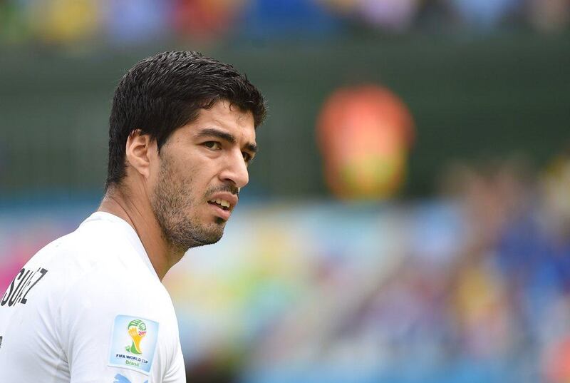Luis Suarez shown during the match against Italy in which he bit Giorgio Chiellini. Emmanuel Dunand / AFP / June 24, 2014