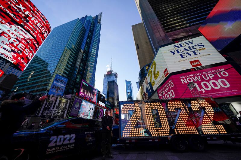 Revellers will still ring in the New Year in New York's Times Square next week, but celebrations have been scaled back. AP