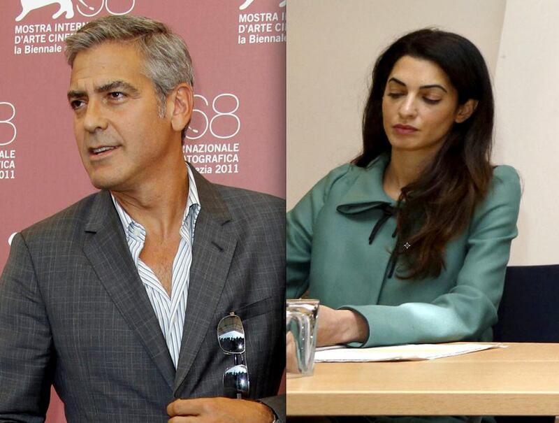 George Clooney poses at the photo call for the film. AP. Laywer Amal Alamuddin working.  