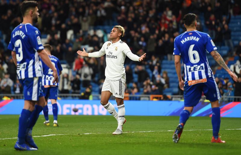 Mariano of Real Madrid, centre, celebrates after scoring. Getty