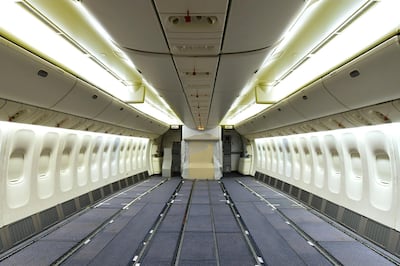 The airline removes the seats from the economy class cabin to allow more room for cargo. Courtesy Emirates
