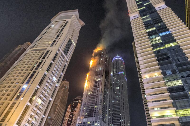 DUBAI. UNITED ARAB EMIRATES, 04 AUGUST 2017. A massive fire rips through The Marina Torch tower's southern corner. (Photo: Antonie Robertson) Journalist: None. Section: National.