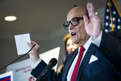 Rudy Giuliani, personal lawyer to U.S. President Donald Trump, speaks during a news conference at the Republican National Committee headquarters in Washington, D.C., U.S., on Thursday, Nov. 19, 2020. President Donald Trump’s campaign revised a pivotal Pennsylvania lawsuit seeking to block certification of the state’s election results, adding a proposal that the Republican-controlled state legislature choose the winner instead of voters. Photographer: Al Drago/Bloomberg