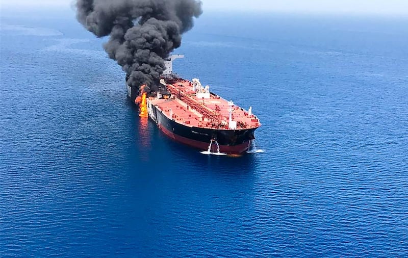Fire and smoke billows from a tanker that attacked in the waters of the Gulf of Oman. AFP