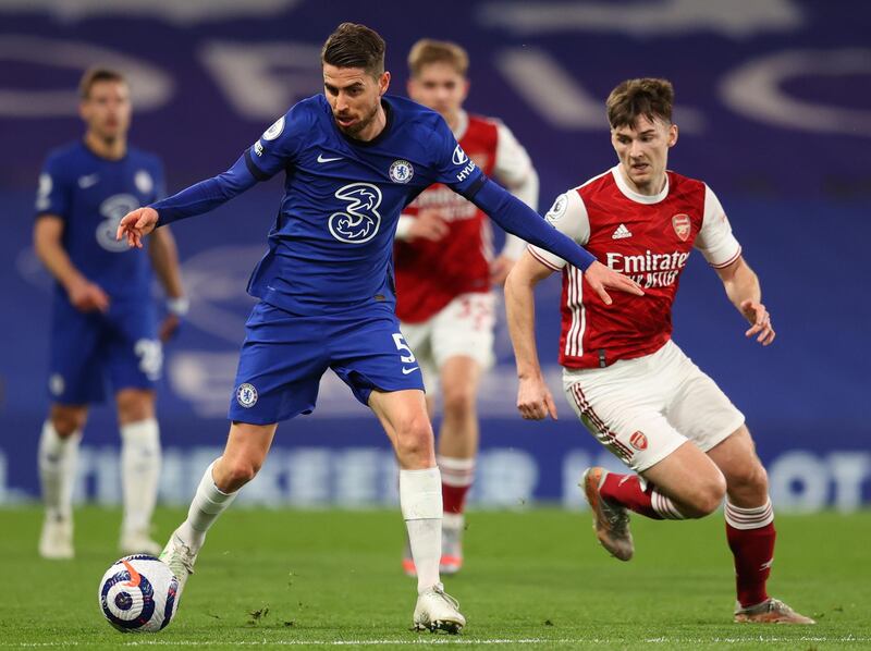 Chelsea's Jorginho under pressure from Arsenal's Kieran Tierney. EPA