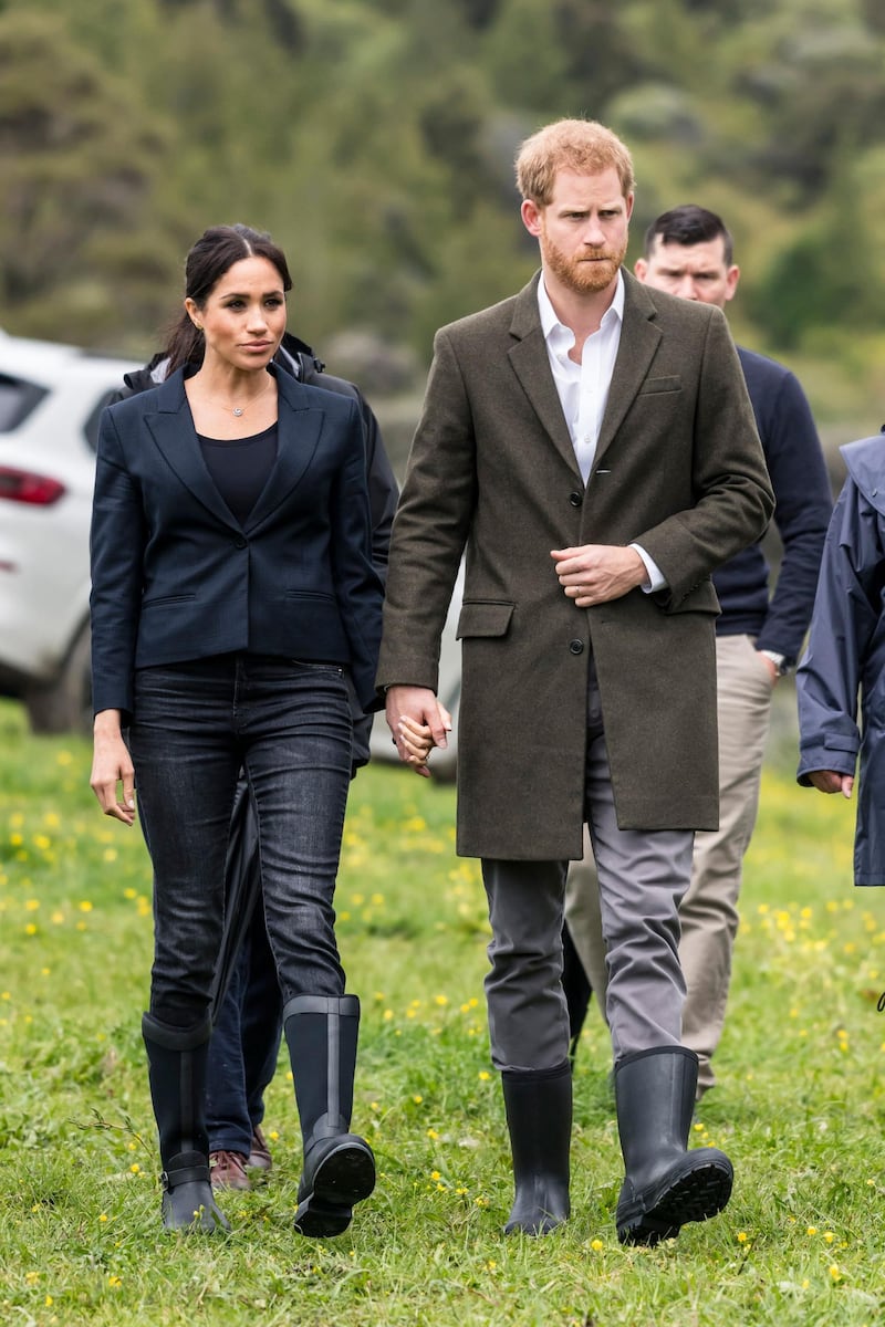 Meghan, Duchess of Sussex, wears a Karen Walker blazer, J Crew jeans, and Muck Boots at The North Shore Riding Club in Auckland on October 30, 2018. AFP