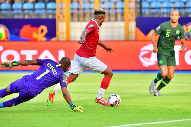 Madagascar midfielder Lalaina Nomenjanahary rounds the Nigeria goalkeeper to give his side the lead. AFP