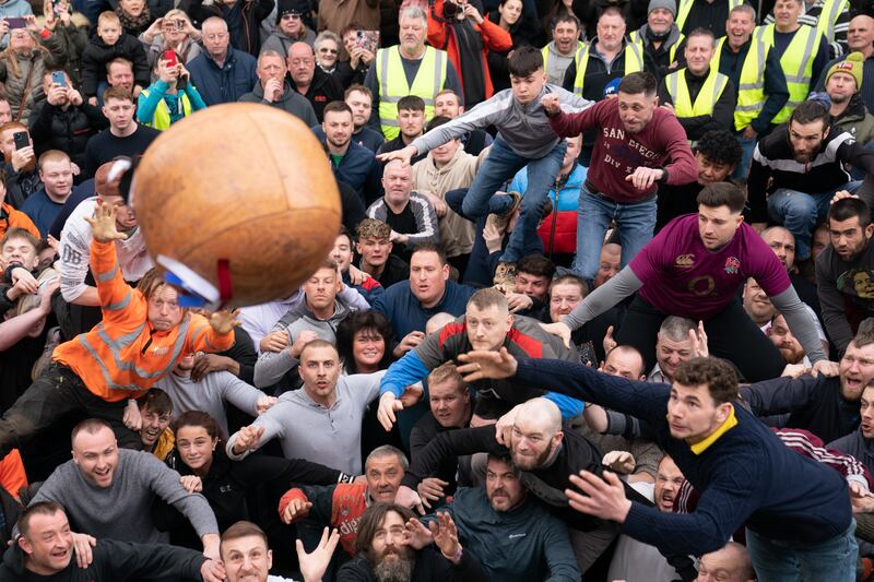 Tuesday also saw players take part in the Atherstone Ball Game in Atherstone, Warwickshire. The game honours a match played between Leicestershire and Warwickshire in 1199, when teams used a bag of gold as a ball. PA
