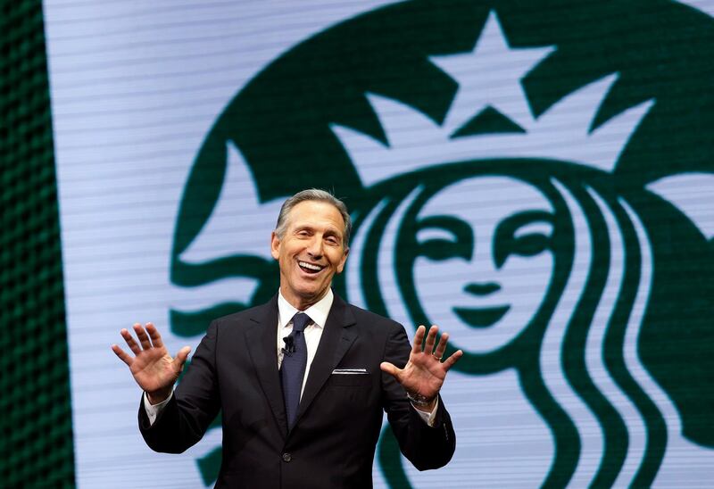 FILE - In this March 22, 2017 file photo, Starbucks CEO Howard Schultz speaks at the Starbucks annual shareholders meeting in Seattle. Schultz says the company will now allow people to use bathrooms at its coffee shops even if they donâ€™t buy anything, as it continues to take a closer look at its operations following the arrest of two black men at a Philadelphia shop. Schulz discussed the new policy while he spoke at the Atlantic Council in Washington, Thursday, May 10, 2018. Schultz said the company previously had a â€œloose policyâ€ that only paying customers be allowed to use bathrooms, but that it was up to each store manager to decide. (AP Photo/Elaine Thompson, File)