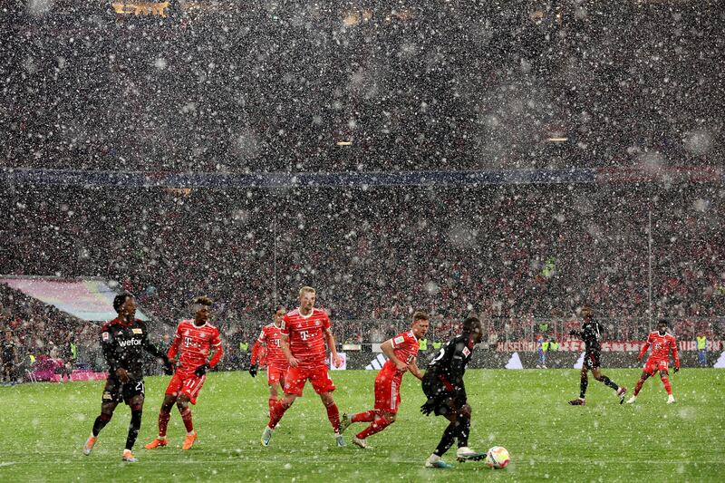 Snow falls during the game in Munich. Getty