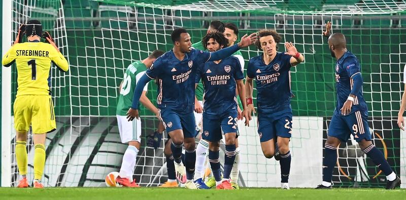 Arsenal's David Luiz , second right, celebrates his goal. AFP