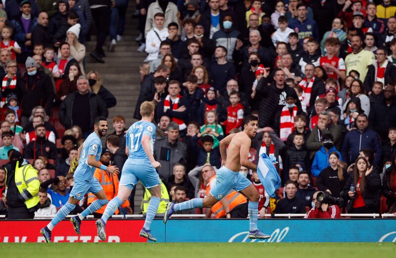 Rodri - 7: One beautiful turn and ball forward but not his usual dominant self in midfield in first half. Snatched injury-time winner when he poked home from close range and annoyed Arsenal fans by whipping shirt of and celebrating right in front of them. Reuters