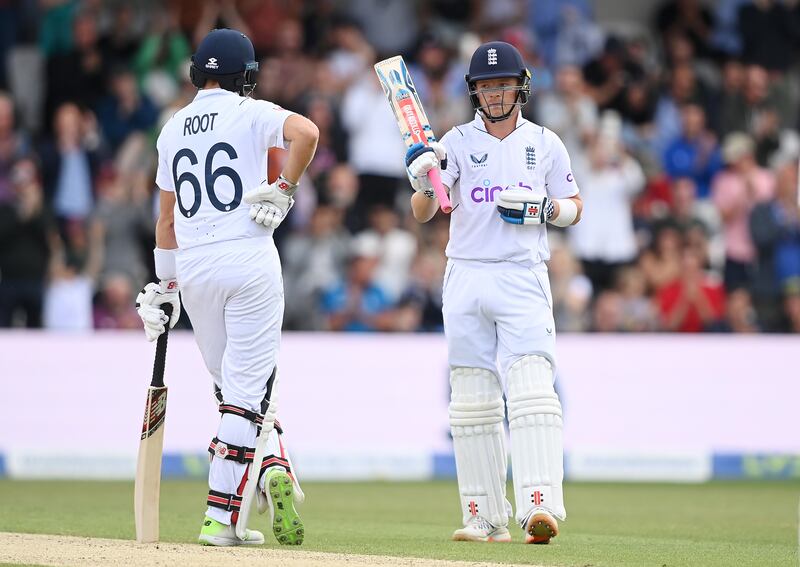 Ollie Pope of England celebrates reaching his fifty. He finished the day unbeaten on 81. Getty