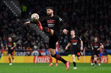 AC Milan's French forward Olivier Giroud controls the ball during the UEFA Champions League first round Group B football match between Club Atletico de Madrid and AC Milan at the Wanda Metropolitano stadium in Madrid on November 24, 2021.  (Photo by PIERRE-PHILIPPE MARCOU  /  AFP)