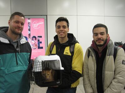 Berliner Jonas Herzer (left) offered to take in Moroccan students Marouane Assila (centre) and Ilias Elhayani, who attended university in Kharkiv. They escaped war torn Ukraine via Hungary and Slovakia. Photo: Daniel Bardsley for The National