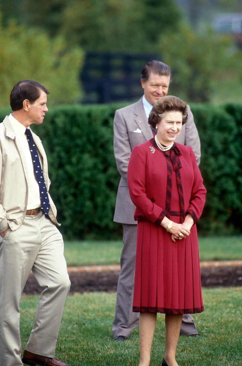 Queen Elizabeth II visits Lane's End horse farm in central Kentucky in 1984. Getty Images