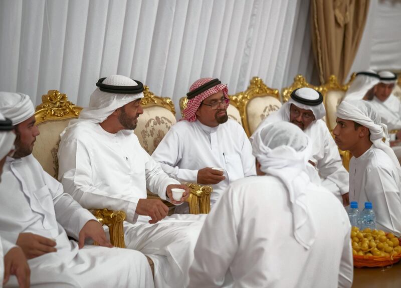 BANIYAS, ABU DHABI, UNITED ARAB EMIRATES - September 15, 2019: HH Sheikh Mohamed bin Zayed Al Nahyan, Crown Prince of Abu Dhabi and Deputy Supreme Commander of the UAE Armed Forces (2nd L), offers condolences to the family of martyr Warrant Officer Saleh Hassan Saleh bin Amro.

( Mohamed Al Hammadi / Ministry of Presidential Affairs )
---