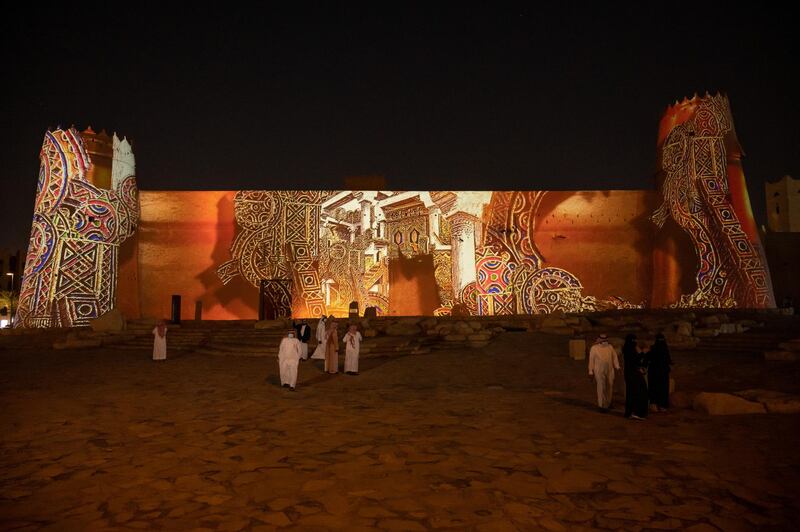 During the Noor Riyadh festival, Al Ruzaiza's artworks were projected onto the Masmak Fort – which Al Ruzaiza used in the well-known logo he deisgned for the 100th anniversary of the founding of the Saudi state. Courtesy Noor Riyadh