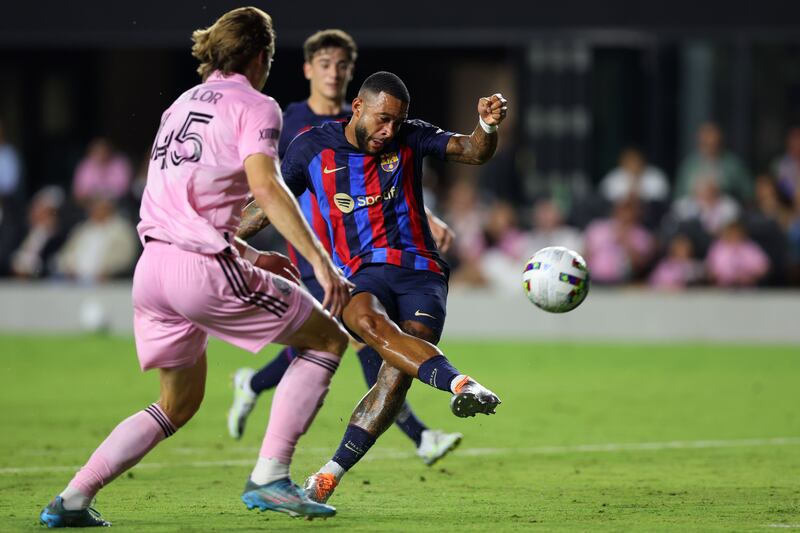 Memphis Depay shoots to score Barcelona's fifth goal against Inter Miami during the preseason friendly at DRV PNK Stadium on July 19, 2022 in Fort Lauderdale, Florida. Getty

