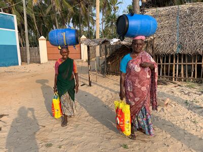 Seaweed harvesters heading out to sea in Bharathinagar in Tamil Nadu, India. Photo: Thomson Reuters Foundation / Anuradha Nagaraj