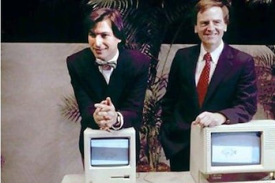 Steve Jobs, left, presents the new Macintosh personal computer in 1984 with then chief executive John Sculley. AP 