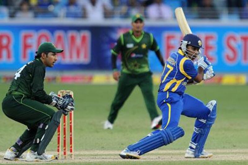 Sri Lanka's cricketer Mahela Jayawardene, right, needs only 13 runs on Friday to reach 10,000 in his ODI career.