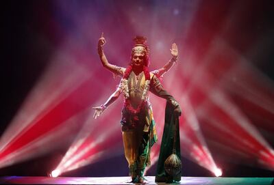 An artist dressed as Vishnu takes part in a performance during celebrations to mark the Janmashtami festival in New Delhi. Reuters