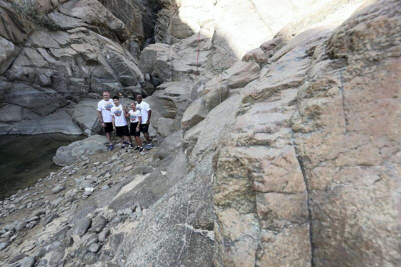 FUJAIRAH , UNITED ARAB EMIRATES , March 4 – 2019 :- Left to Right – Gary Fournier , Hung Chow, Special Olympics athlete , Delia Newman and Allen Jones from Law Enforcement Torch Run with the Special Olympics torch “Flame of Hope” in Wadi Al Wurayah Waterfalls in Fujairah. ( Pawan Singh / The National )
For News/Online/Instagram/Big Picture. Story by Ruba
