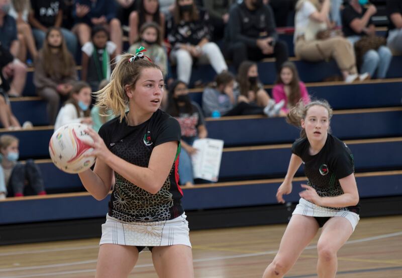 Girls take part in netball training at Dubai College.