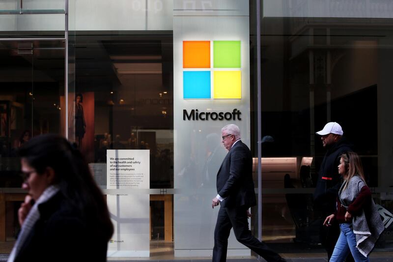 Pedestrians walk past a closed Microsoft Corp. store at Pitt Street Mall in Sydney, Australia on Tuesday, June 23, 2020. While the Australian economy lost more than 800,000 jobs in April and May, more timely indicators are painting a better picture. Outside of a small outbreak in the southern state of Victoria, authorities have flattened the Covid-19 infection curve and are reopening the economy earlier than expected. Photographer: Lisa Maree Wiliams/Bloomberg