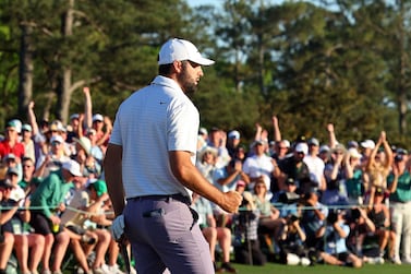 AUGUSTA, GEORGIA - APRIL 13: Scottie Scheffler of the United States reacts after making birdie on the 18th green during the third round of the 2024 Masters Tournament at Augusta National Golf Club on April 13, 2024 in Augusta, Georgia.    Andrew Redington / Getty Images / AFP (Photo by Andrew Redington  /  GETTY IMAGES NORTH AMERICA  /  Getty Images via AFP)