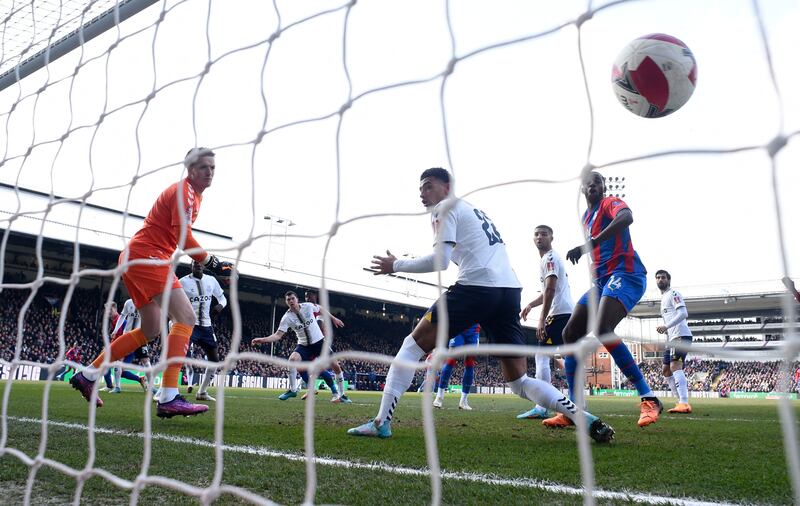 Crystal Palace's Marc Guehi scores the first goal past Everton's Jordan Pickford on their way to a 4-0 win in the FA Cup. Reuters