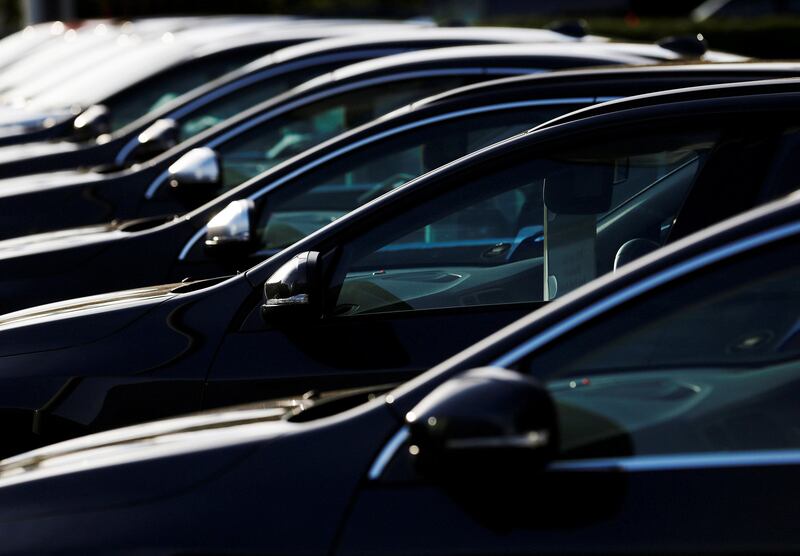 FILE PHOTO: Cars are displayed outside a Volvo showroom in west London, Britain October 4, 2013. REUTERS/Luke MacGregor/File Photo