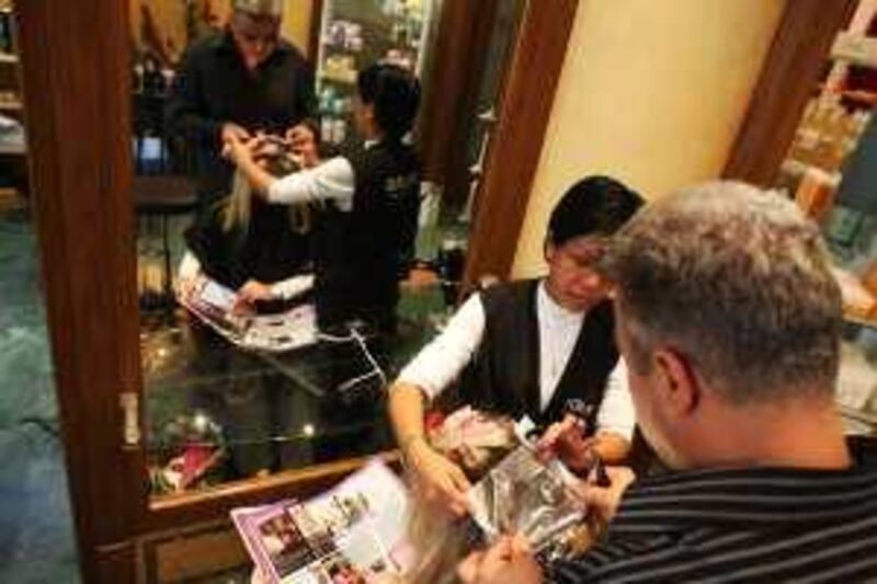 United Arab Emirates - Abu Dhabi - February 16th, 2009:  Elie Hanna cuts a costumer's hair at La Finesse Salon at Le Meridien Hotel  (Galen Clarke/The National)  for story by Roland Hughes *** Local Caption ***  GC08_02162009_Hair.jpgGC08_02162009_Hair.jpg