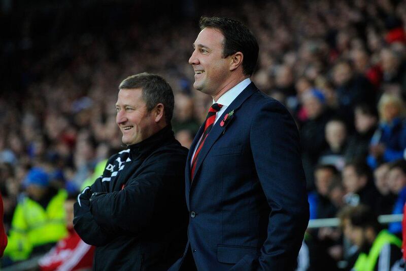 Malky Mackay has Cardiff in 12th on the Premier League table through 10 matches, with 12 points. Stu Forster / Getty Images