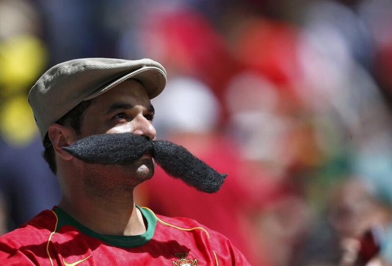 A Portugal fan watches his team play against Germany. Marcos Brindicci / Reuters