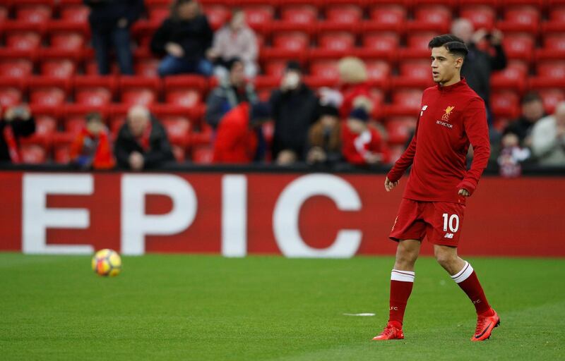 Soccer Football - Premier League - Liverpool vs Leicester City - Anfield, Liverpool, Britain - December 30, 2017   Liverpool's Philippe Coutinho warms up before the match   REUTERS/Phil Noble    EDITORIAL USE ONLY. No use with unauthorized audio, video, data, fixture lists, club/league logos or "live" services. Online in-match use limited to 75 images, no video emulation. No use in betting, games or single club/league/player publications.  Please contact your account representative for further details.