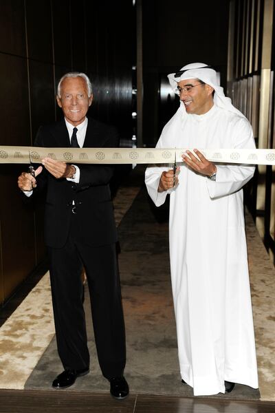 Mohamed Alabbar, chairman of Emaar Properties, right, and Giorgio Armani open Armani Hotel Dubai in 2010. Photo: Stefano Guindani / SGP / Armani Hotel Dubai