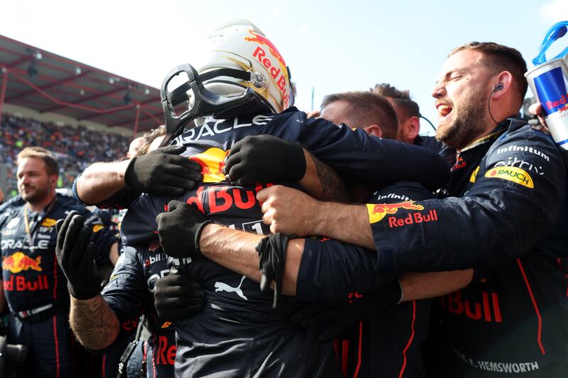 Max Verstappen of Red Bull Racing celebrates with his team. Getty Images