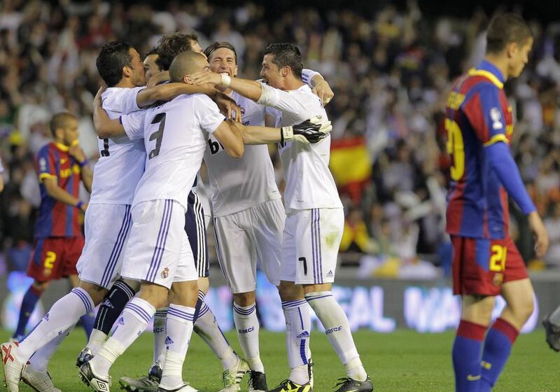 Madrid celebrate beating Barca in the 2011 final. Andres Kudacki / AFP