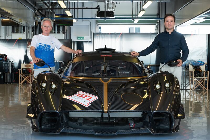 Horacio and son Christopher Pagani beside a Huayra R at Yas